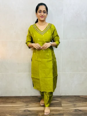 Premium semi raw silk top(cotton lining)with exclusive handwork and allover zari weaving buttas paired with semi raw silk bottom(free size)
