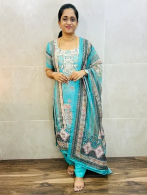 Printed muslin silk top(cotton lining) with allover embroidery paired with muslin silk dupatta and santoon bottom(free size)