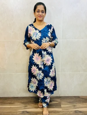 Printed rayon top (crepe lining) with allover fancy buttons paired with printed rayon bottom (semi palazzo)