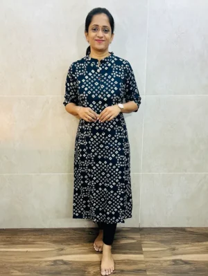 Printed rayon top with all over fancy buttons (panel cut)