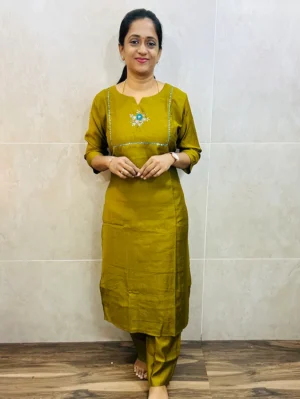 Premium soft silk cotton top (crepe lining) with exclusive hand worked yoke paired with silk cotton bottom (semi palazzo)