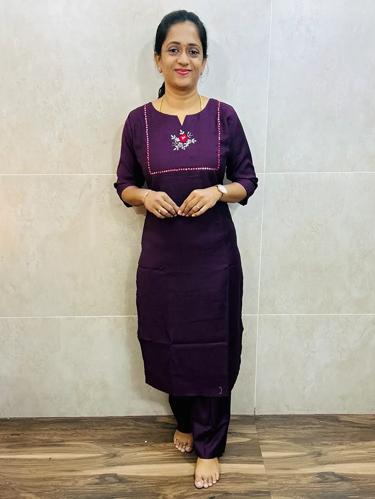 Premium soft silk cotton top (crepe lining) with exclusive hand worked yoke paired with silk cotton bottom (semi palazzo)