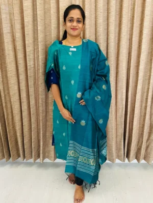 Rama Green - Semi raw silk top (cotton lining) with all over zari woven buttas paired with zari woven semi raw silk dupatta