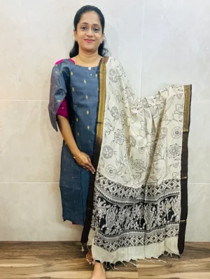 Semi raw silk top (cotton lining) with all over zari woven buttas paired with Kalamkari printed chennuri silk dupatta