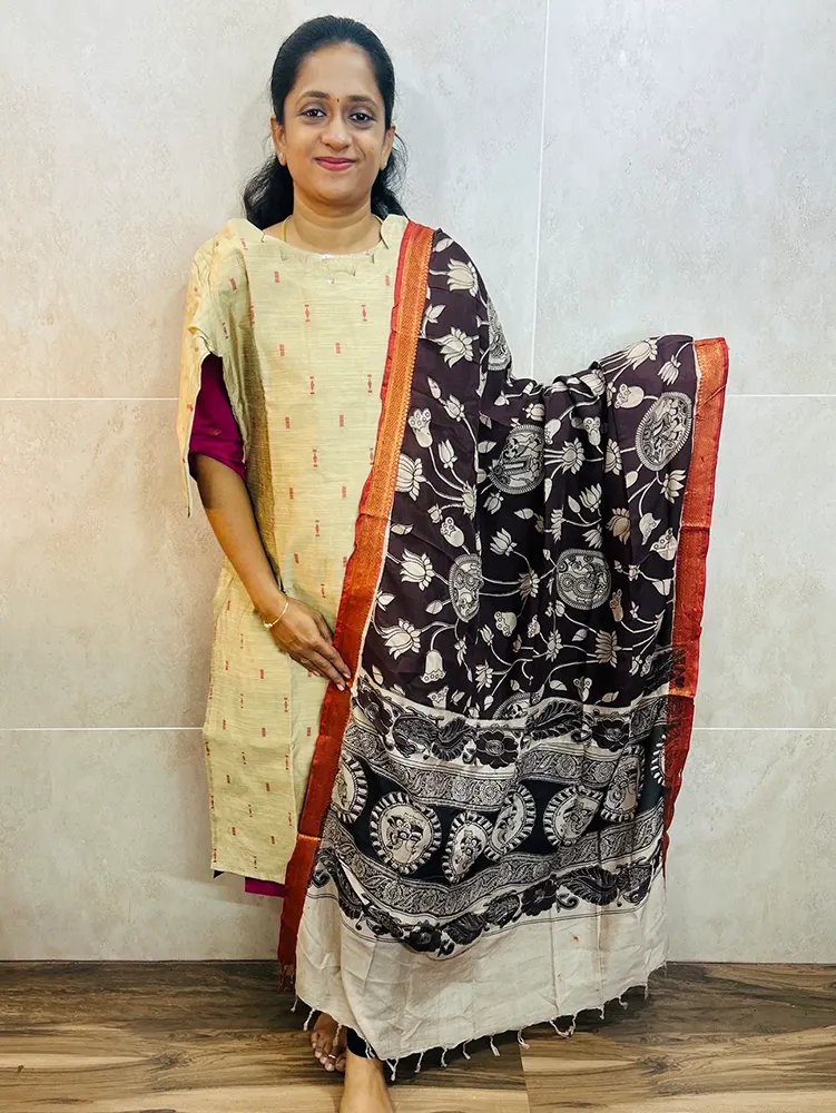 Semi raw silk top (cotton lining) with all over zari woven buttas paired with Kalamkari printed chennuri silk dupatta