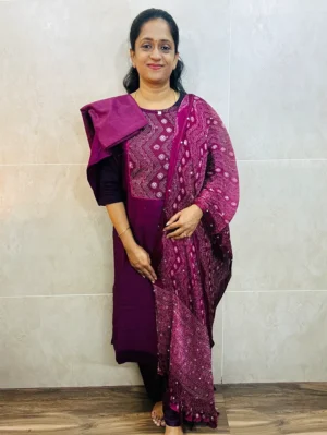 Soft silk top (crepe lining) with patchwork on yoke paired with mirror worked dupatta and silk bottom (free size)