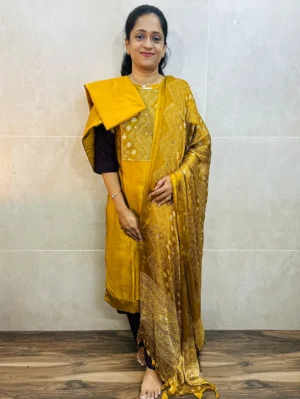 Soft silk top (crepe lining) with patchwork on yoke paired with mirror worked dupatta and silk bottom (free size)