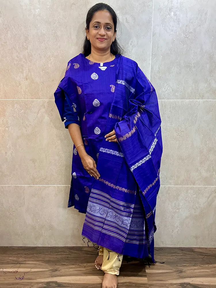 Semi raw silk top (cotton lining) with all over zari woven buttas paired with zari woven semi raw silk dupatta with semi raw silk bottom (Free size)