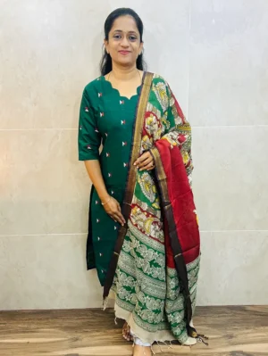 Semi raw silk top (cotton lining) with all over zari woven buttas paired with Kalamkari printed chennuri silk dupatta with semi raw silk bottom (free size)