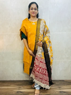 Semi raw silk top (cotton lining) with all over zari woven buttas paired with Kalamkari printed chennuri silk dupatta with semi raw silk bottom (free size)