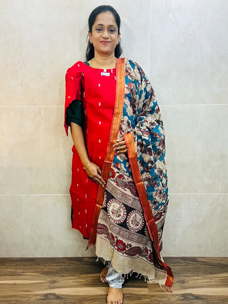 Semi raw silk top (cotton lining) with all over zari woven buttas paired with Kalamkari printed chennuri silk dupatta with semi raw silk bottom (free size)