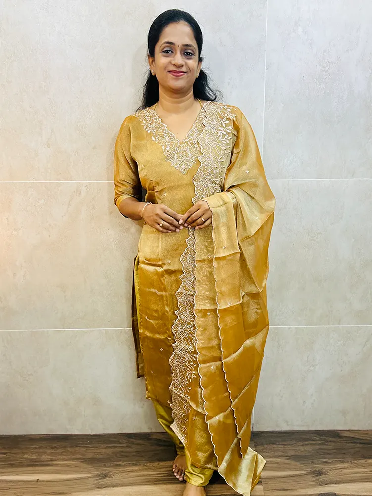 Premium soft tissue silk top (cotton lining) with hand worked yoke paired with soft tissue dupatta and silk bottom (free size)