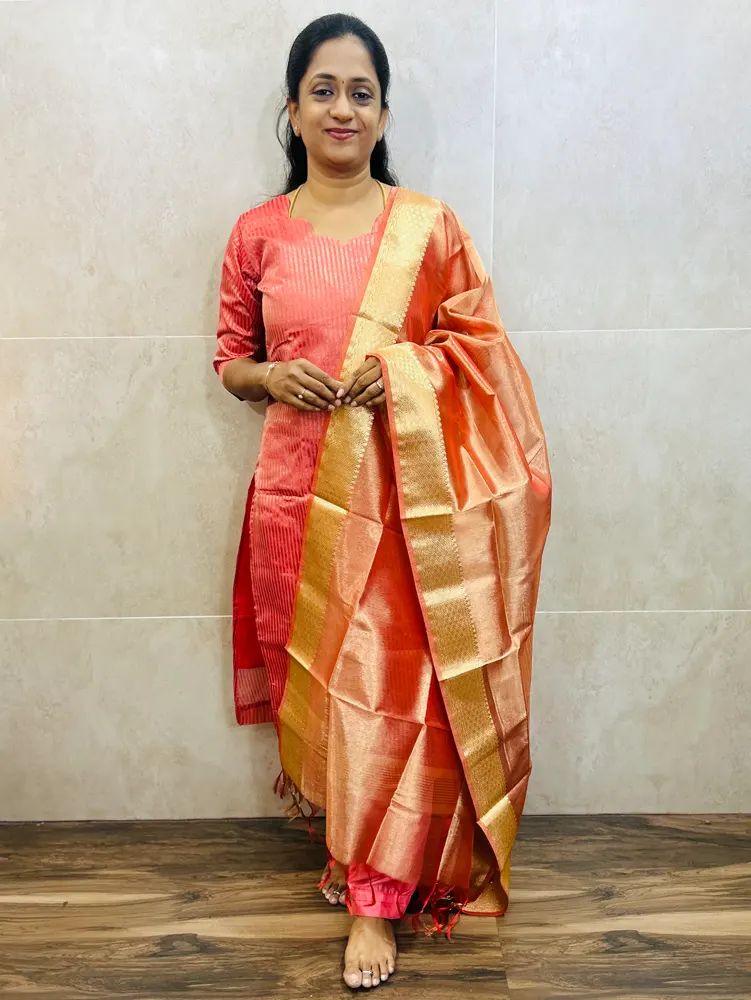 Soft tissue silk top(cotton lining)with allover weavings paired with soft tissue silk dupatta and silk bottom(free size)