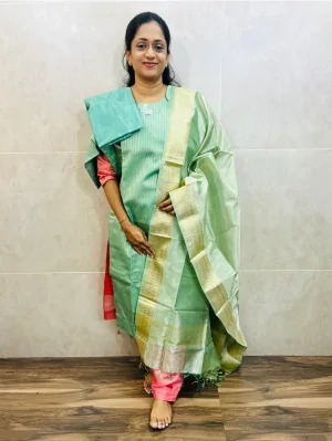 Soft tissue silk top(cotton lining)with allover weavings paired with soft tissue silk dupatta and silk bottom(free size)