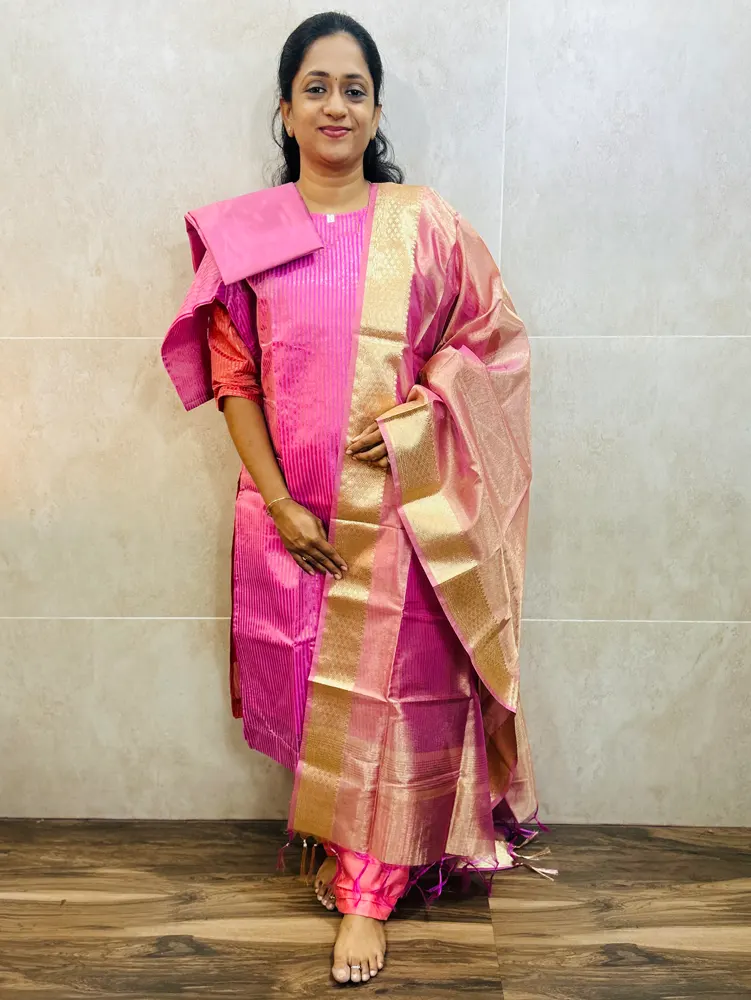 Soft tissue silk top(cotton lining)with allover weavings paired with soft tissue silk dupatta and silk bottom(free size)