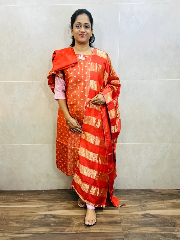 Soft tissue silk top(cotton lining) with allover jacquard and zari woven buttas paired with soft silk dupatta and silk bottom(free size)