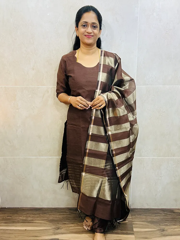 Premium silk cotton top (cotton lining) with zari weaving paired with zari weaved silk cotton dupatta and semi raw silk bottom (free size)