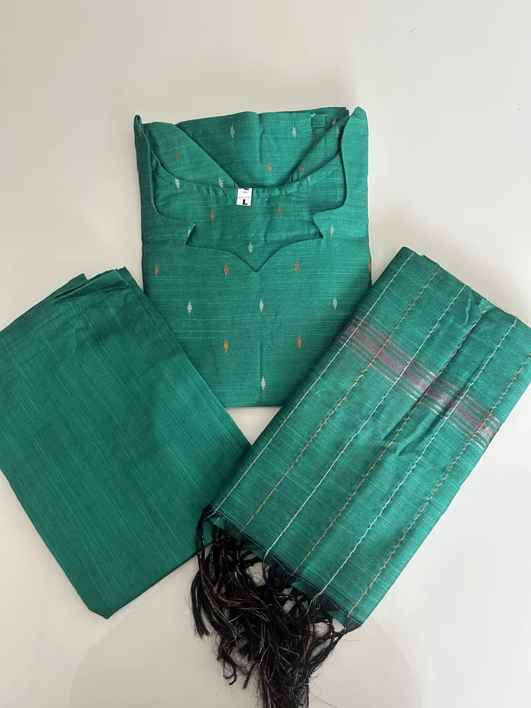 Semi raw silk top (cotton lining) paired with semi raw silk dupatta and semi raw silk bottom (Free size)