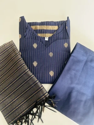 Semi Maheshwari silk top (cotton lining) with allover zari weaving a paired with zari weaved Maheshwari silk dupatta and semi raw silk bottom (free size)