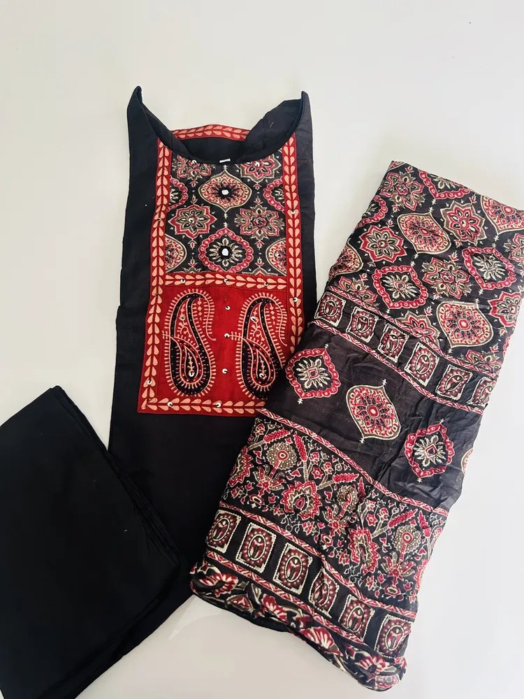 Pure cotton top (cotton lining) with mirror worked Ajrakh patchwork on yoke paired with printed muslin silk dupatta and cotton bottom (free size)