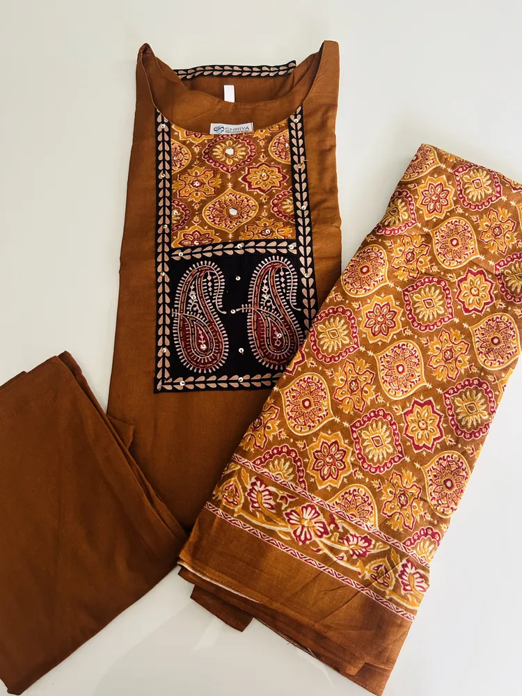 Pure cotton top (cotton lining) with mirror worked Ajrakh patchwork on yoke paired with printed muslin silk dupatta and cotton bottom (free size)