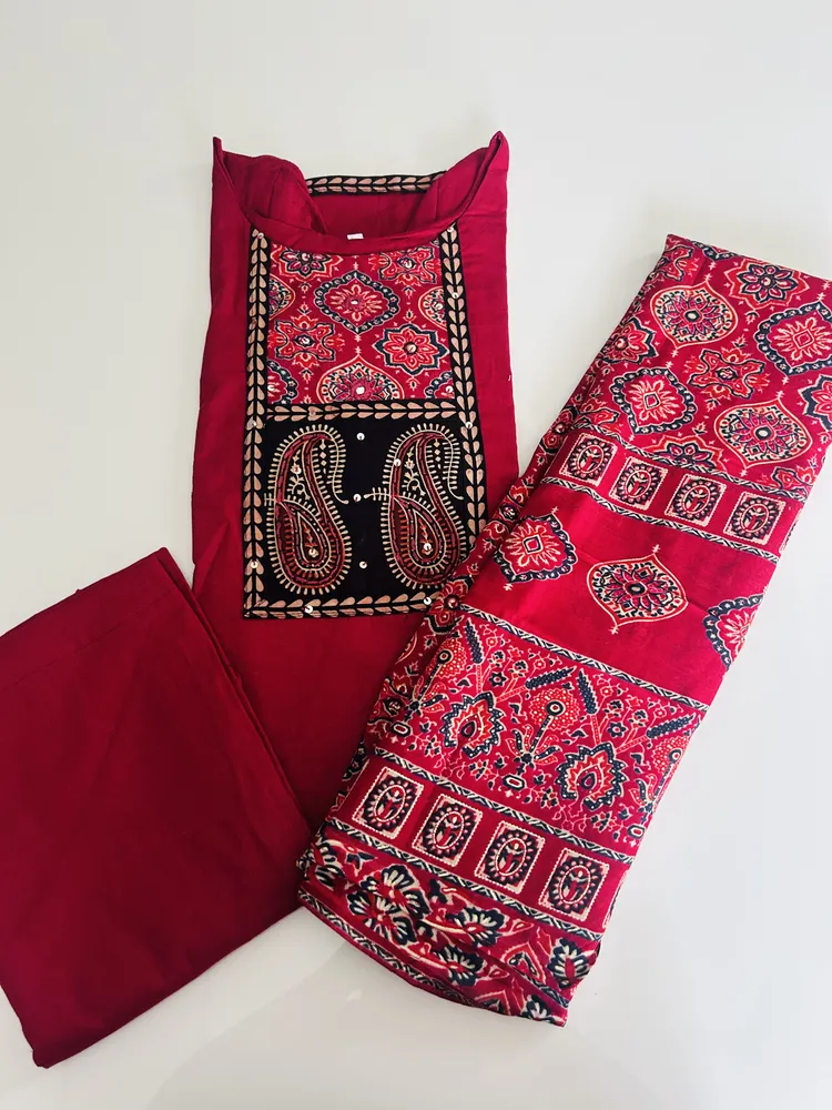 Pure cotton top (cotton lining) with mirror worked Ajrakh patchwork on yoke paired with printed muslin silk dupatta and cotton bottom (free size)