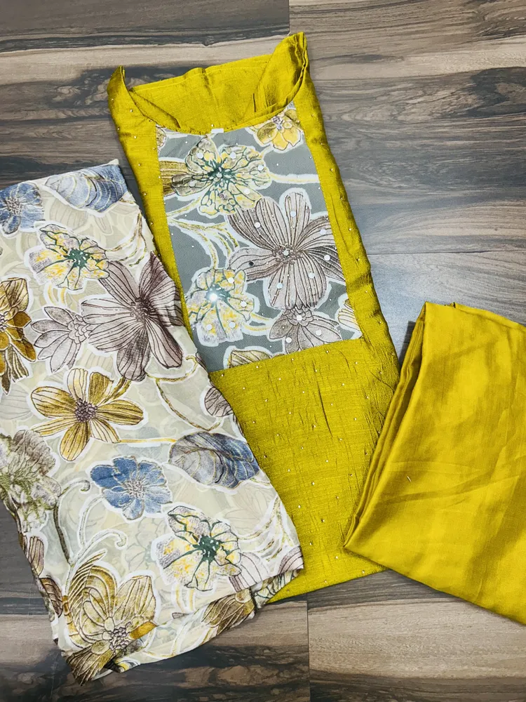 Soft silk top (crepe lining) with mirror worked brasso patchwork on yoke paired with brasso dupatta and silk bottom (free size)