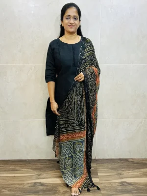 Soft silk top (cotton lining) with Potli work on yoke paired with mirror worked bhandini Dupatta and silk bottom (free size)