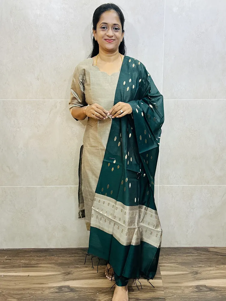 Semi Maheshwari silk top (cotton lining) with allover zari woven buttas paired with semi Maheshwari silk dupatta and silk cotton bottom (Free size)