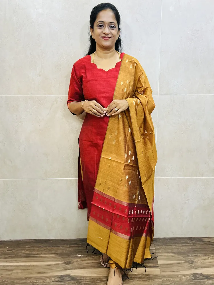 Semi Maheshwari silk top (cotton lining) with allover zari woven buttas paired with semi Maheshwari silk dupatta and silk cotton bottom (Free size)
