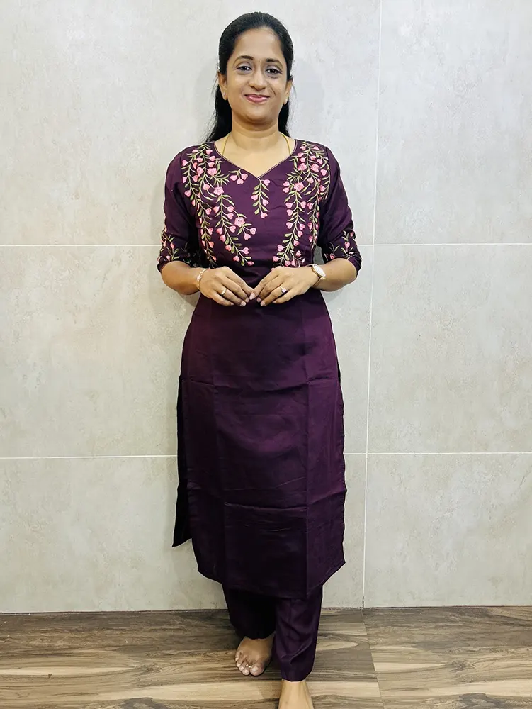 Premium rayon top (cotton lining) with exclusive machine embroidered work on yoke and sleeves paired with rayon bottom (free size)