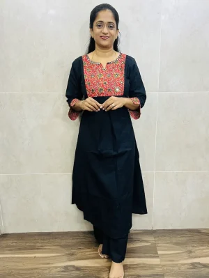 Premium cotton top (Aline -1 side pocket) with mirror work on yoke and sleeves paired with premium cotton bottom (semi palazzo)