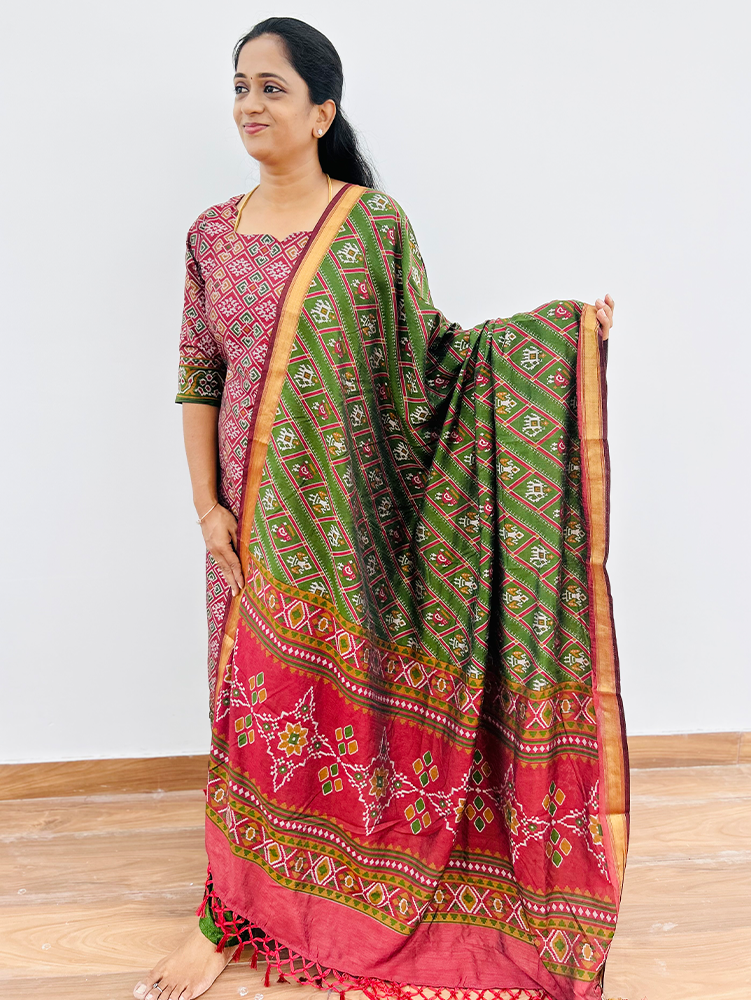 Printed Patola silk top (cotton lining) paired with printed silk dupatta and silk bottom (free size)