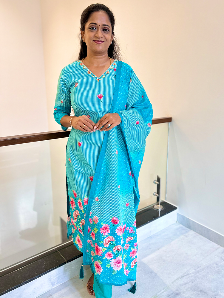 Rama Green - Printed cotton top(cotton lining)with handwork on yoke paired with printed cotton dupatta and cotton bottom(straight cut)