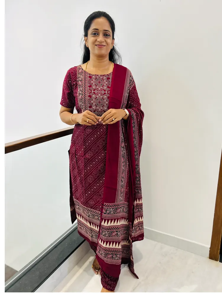 (Maroon)Printed cotton rayon top(cotton lining)paired with printed cotton rayon dupatta and cotton rayon bottom(free size)