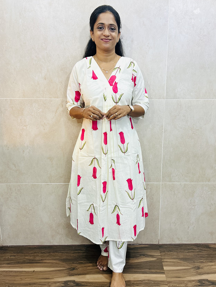 Pink - Printed Jaipur cotton top (cotton lining with 1-side pocket) paired with printed cotton bottom (semi palazzo)