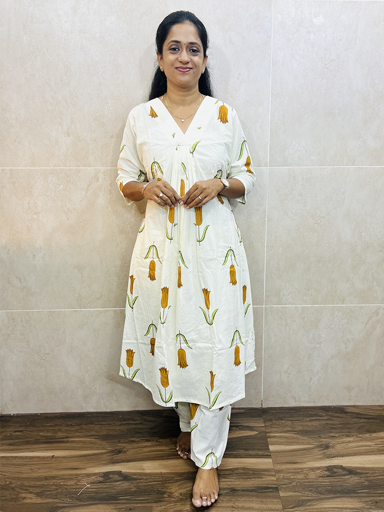 Mustard Yellow - Printed Jaipur cotton top (cotton lining with 1-side pocket) paired with printed cotton bottom (semi palazzo)
