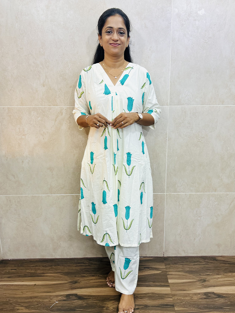 Blue - Printed Jaipur cotton top (cotton lining with 1-side pocket) paired with printed cotton bottom (semi palazzo)